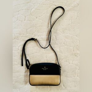 Kate Spade Clover Ivy Street Black and Gold Crossbody bag.